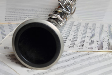 Clarinet. Old clarinet on the old grunge music notes