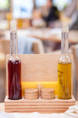 Colored alcohol drink is presented in restaurant