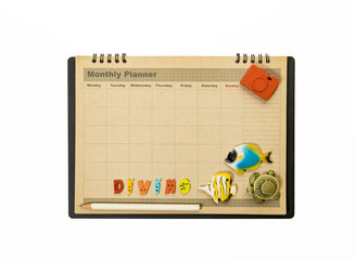 Diving planner schedule decorate with fish,turtle and camera
