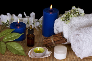 Fototapeta na wymiar Accessories for spa treatments in the candlelight