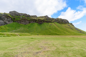 Fototapeta na wymiar Mountain landscape at Seljalandsfoss, Iceland