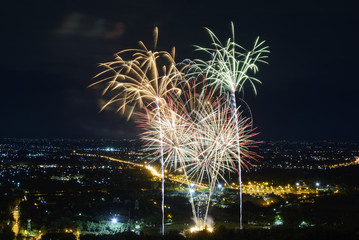 Fireworks on night city background