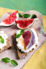 bread with cheese and fresh figs