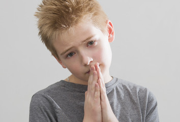 Praying boy