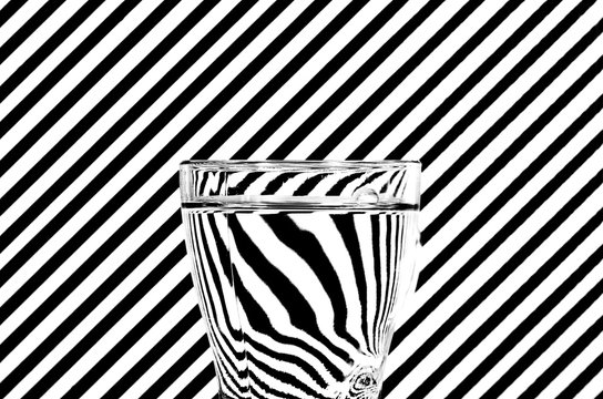 Abstract Refraction Of Black And White Diagonals In A Glass Of W