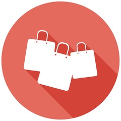 Shopping bags on white circle with a long shadow