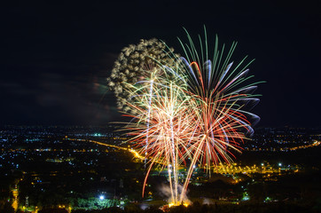 Fireworks on night city background