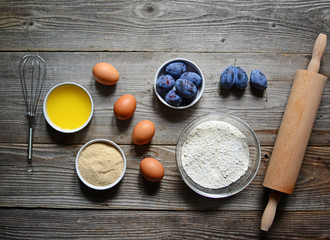Baking cake in rural kitchen - dough recipe ingredients (eggs, f