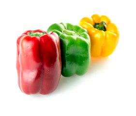 Colorful bell peppers isolated on white