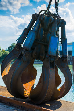 Blue Crane Claw at Dock with blue Sky