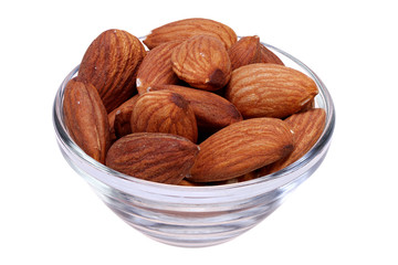 nuts, almonds in clear glass vase Isolated on White with Clipping Path