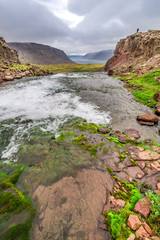 Fototapeta na wymiar Stream leading to a waterfall in Iceland
