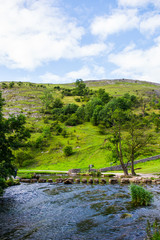 Green Hills, Stepping Stones near River Dove in Peak District Na