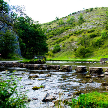 Green Hills, Stepping Stones near River Dove in Peak District Na