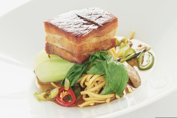 plated pork noodle meal