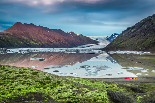 Cold Lake and glacier in the mountains, Iceland