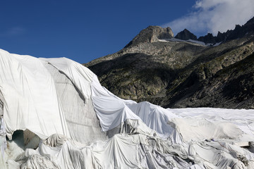 Rhone Glacier in Switzerland covered with fleece against melting
