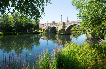 Fototapeta na wymiar old stone bridge at Monforte de Lemos