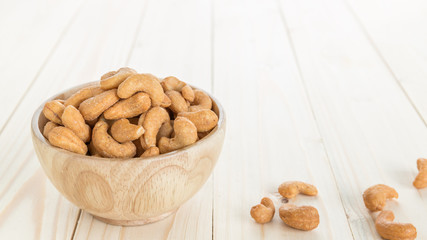cashew nuts in a wooden bowl