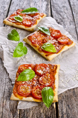 Pie with tomatoes, cheese and Basil