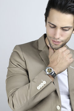 Handsome man wearing a luxury watch