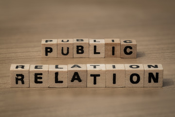 public relation in wooden cubes