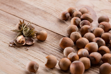 Hazelnuts on brown wooden table