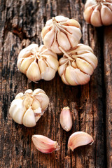 Garlic on old wooden background