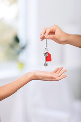 Nice realtor holding keys 