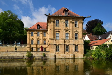 Fototapeta na wymiar Water castle VILLA CONCORDIA on the river Regnitz in Bamberg, Germany