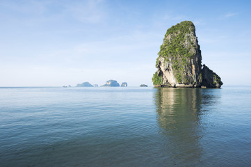 Naklejka premium Dramatic karst mountain island scenery of Railay, in Krabi Thailand from Phranang Beach