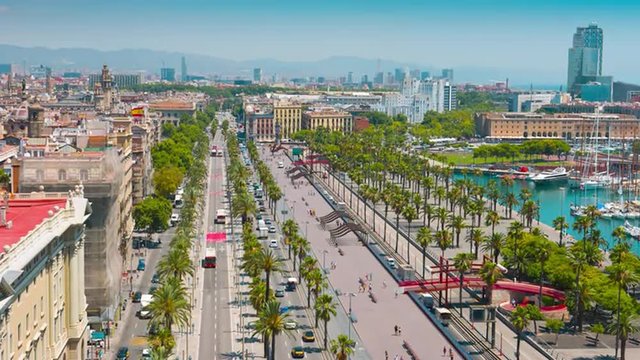 4K Barcelona skyline aerial view, establishing shot city streets traffic