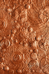 Bronze flowers embossing, gold caring surface background, art painting