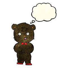 cartoon teddy black bear with thought bubble