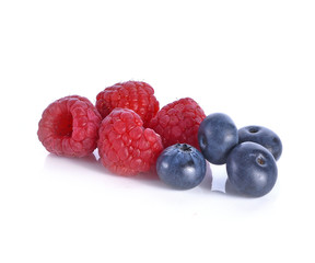 Rraspberry berries in basket isolated white background