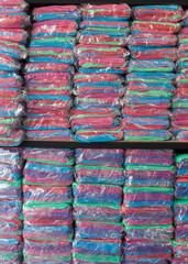 warehouse of towel softness fluffy fiber fabric on shelf
