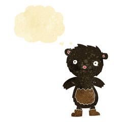 cartoon teddy black bear wearing boots with thought bubble