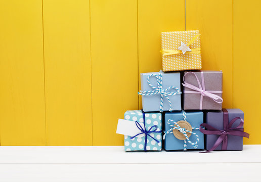 Stack of little present boxes