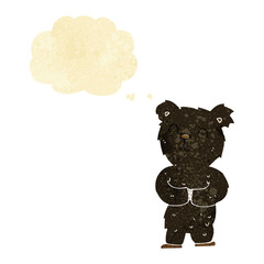 cartoon happy little black bear with thought bubble