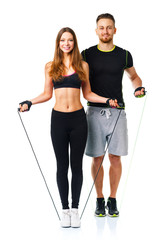 Man and woman with with ropes on the white background