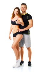 Athletic man and woman after fitness exercise with a thumb up on