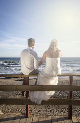Fototapeta premium Wedding day at sea and in the forest