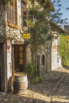 Traditional street restaurant at medieval village Perouges