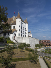 Fototapeta na wymiar Fairytale white castle at Nyon in Switzerland