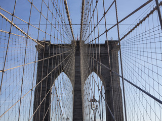 Crossing Brooklyn Bridge on a sunny day NYC