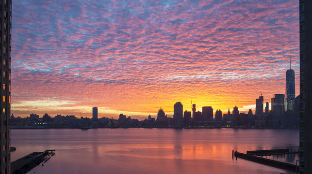 Colorful dreamy sunrise panorama of Manhattan from New Jersey side in New York City