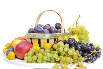 various fruits, grapes, plums, peaches, isolated on white backgr