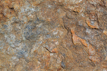 Natural rock texture ancient building close-up mineral structure