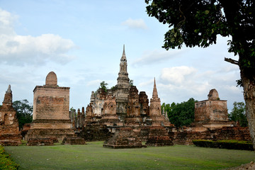 Fototapeta na wymiar Ancrent tample with pagoda and buddha image in sukothai Thailand