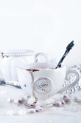 White cup of hot cocoa 